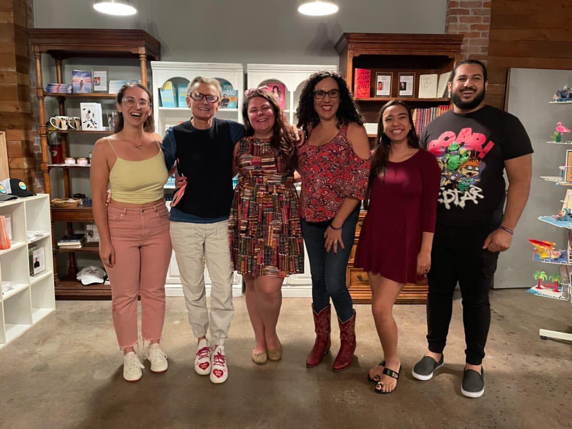 Crystal Adair-Benning with a group of clients at a bookstore event