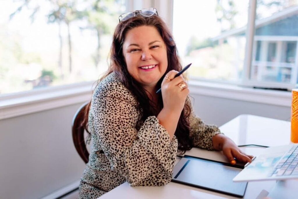 Crystal Adair-Benning, 4x NYT bestselling ghostwriter and book coach, at her desk