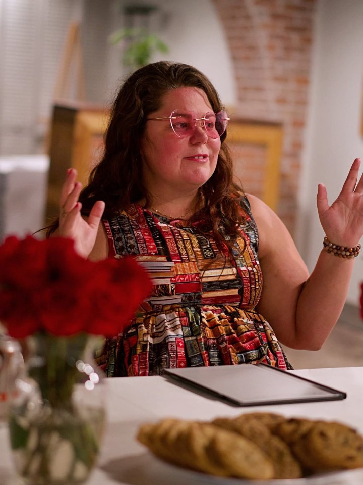 Crystal Adair-Benning mid-explanation while teaching a small group of writers