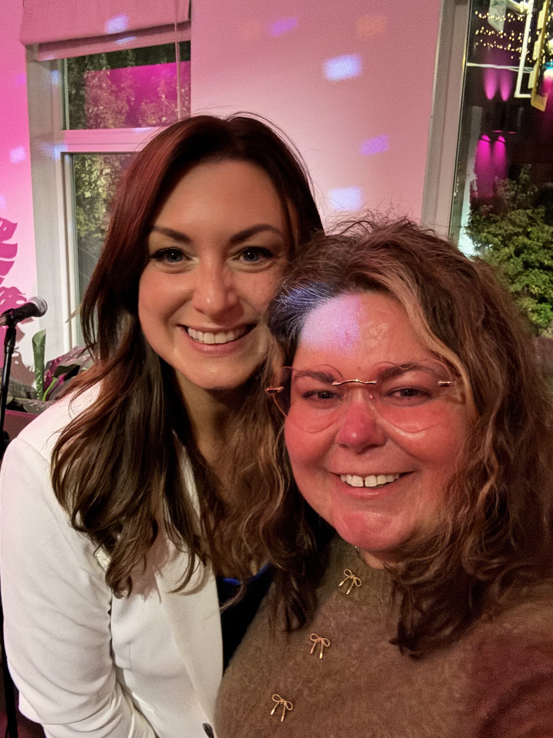 Crystal Adair-Benning with a client at an author event