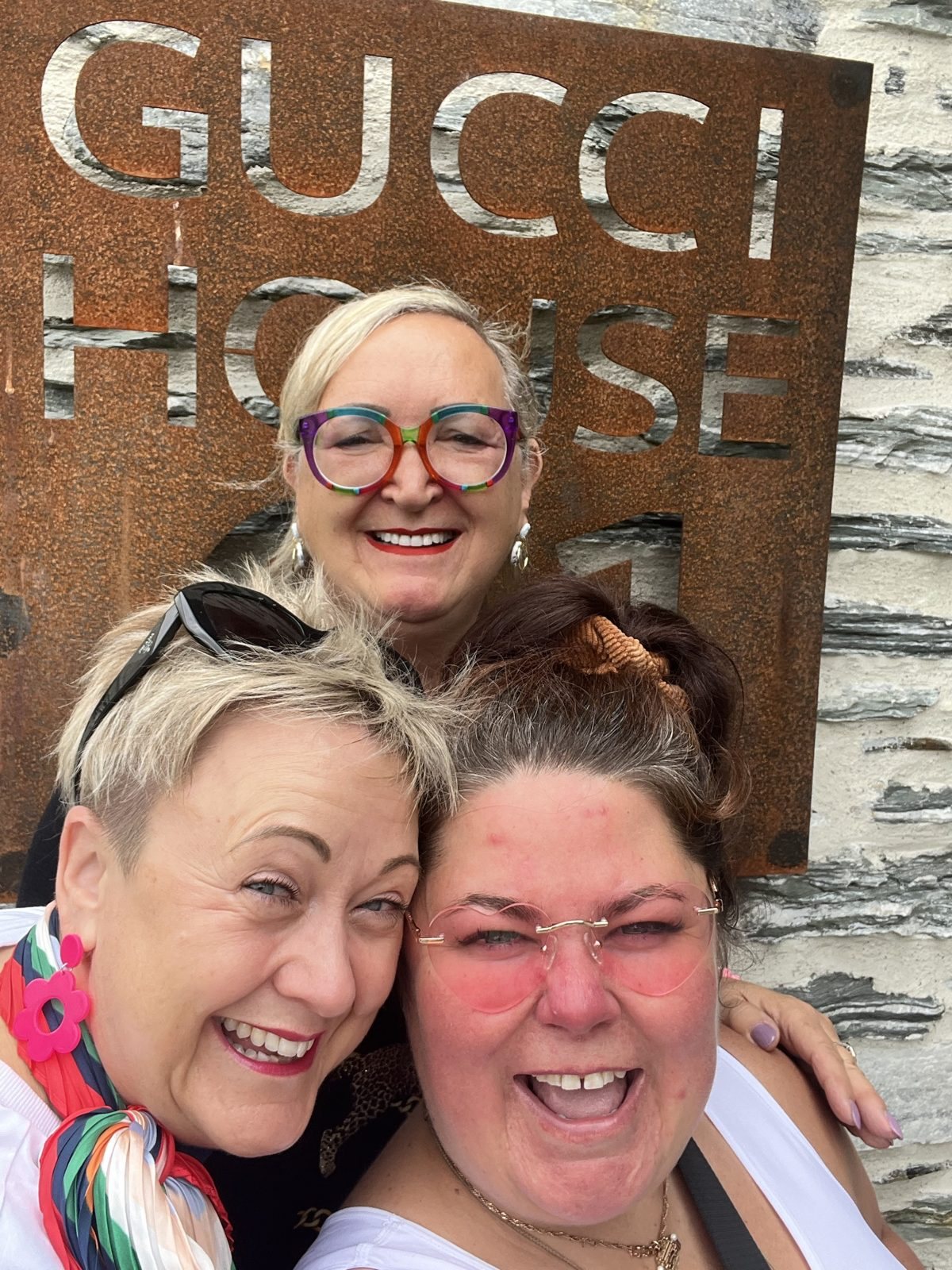 Crystal Adair-Benning with 2 writers outside the Gucci House at a Createcation retreat in Queenstown