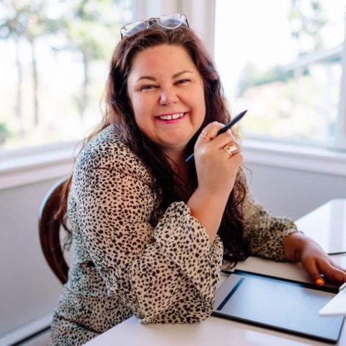 Crystal Adair-Benning, 4x NYT bestselling ghostwriter and book coach, at her desk